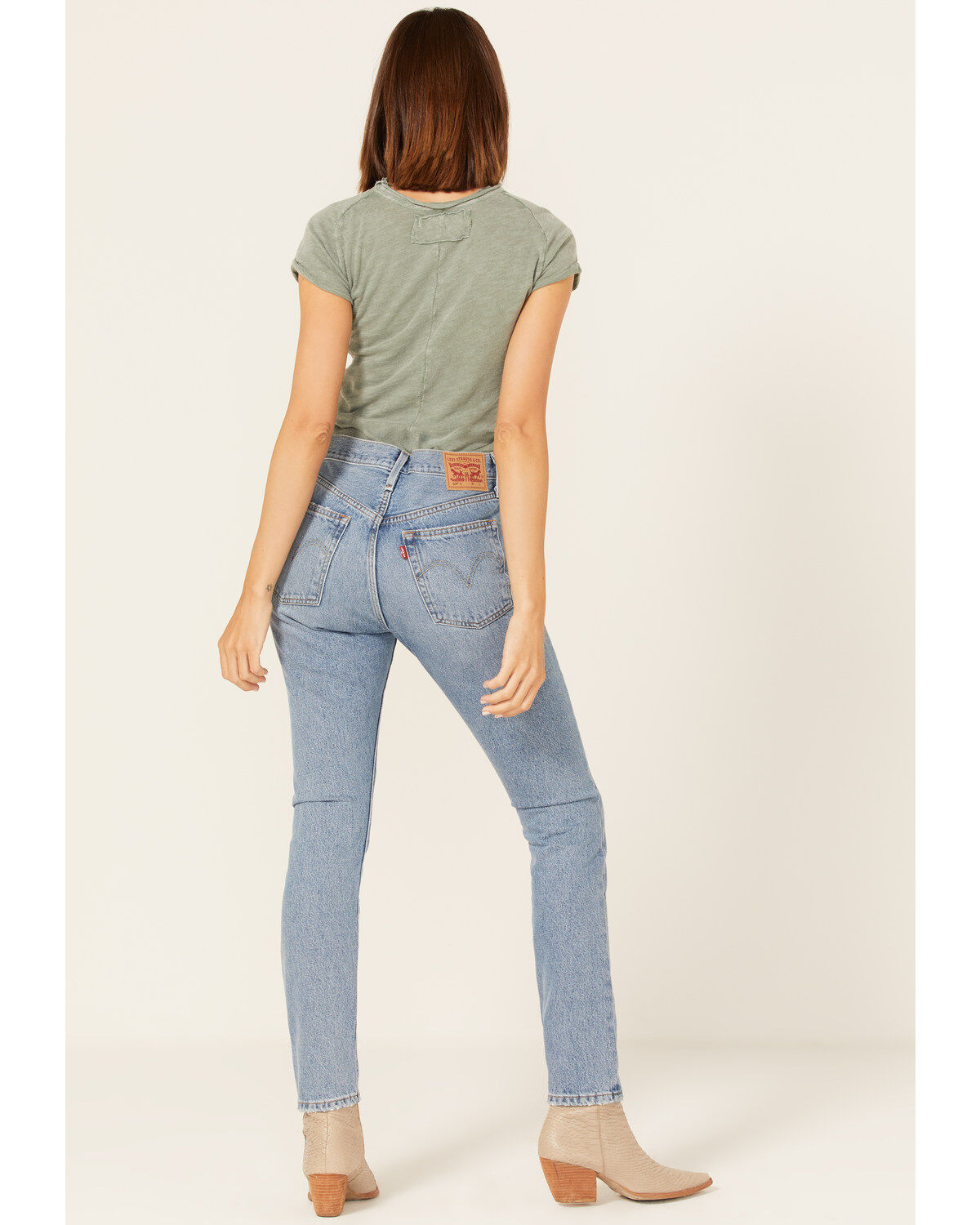 152922-levi-s-women-s-501-medium-wash-mid-rise-distressed-skinny-jeans-1.jpg
