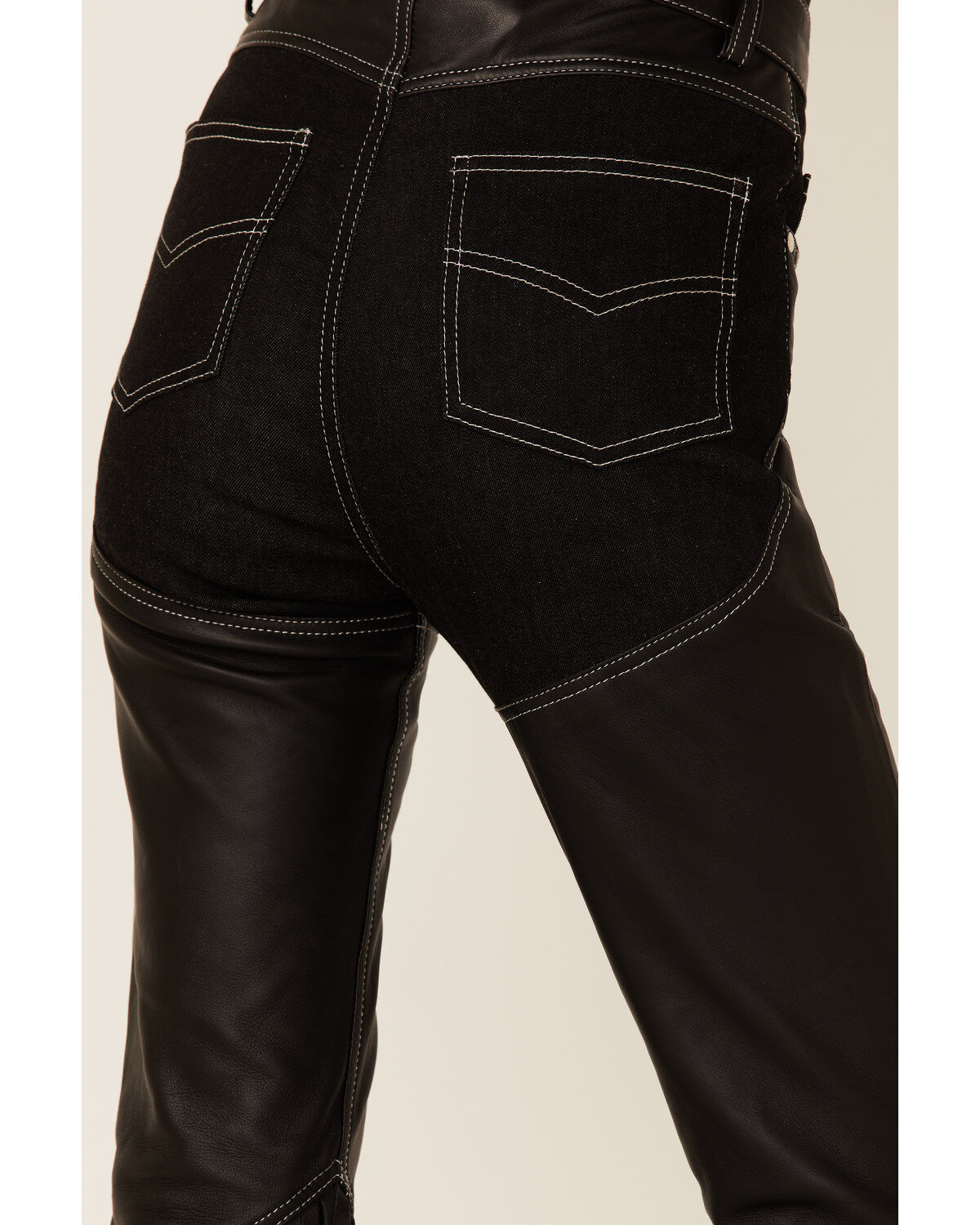 173163-understated-leather-women-s-cowboy-denim-amp-leather-fringe-chap-jeans-1.jpg