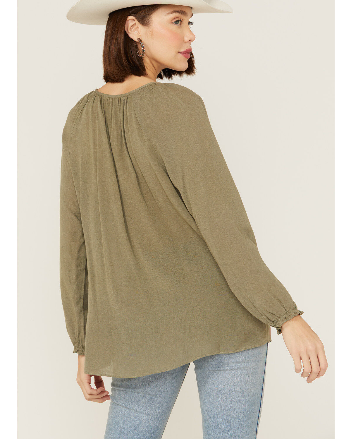 193813-miss-me-women-s-olive-embroidered-southwestern-tassel-top-1.jpg