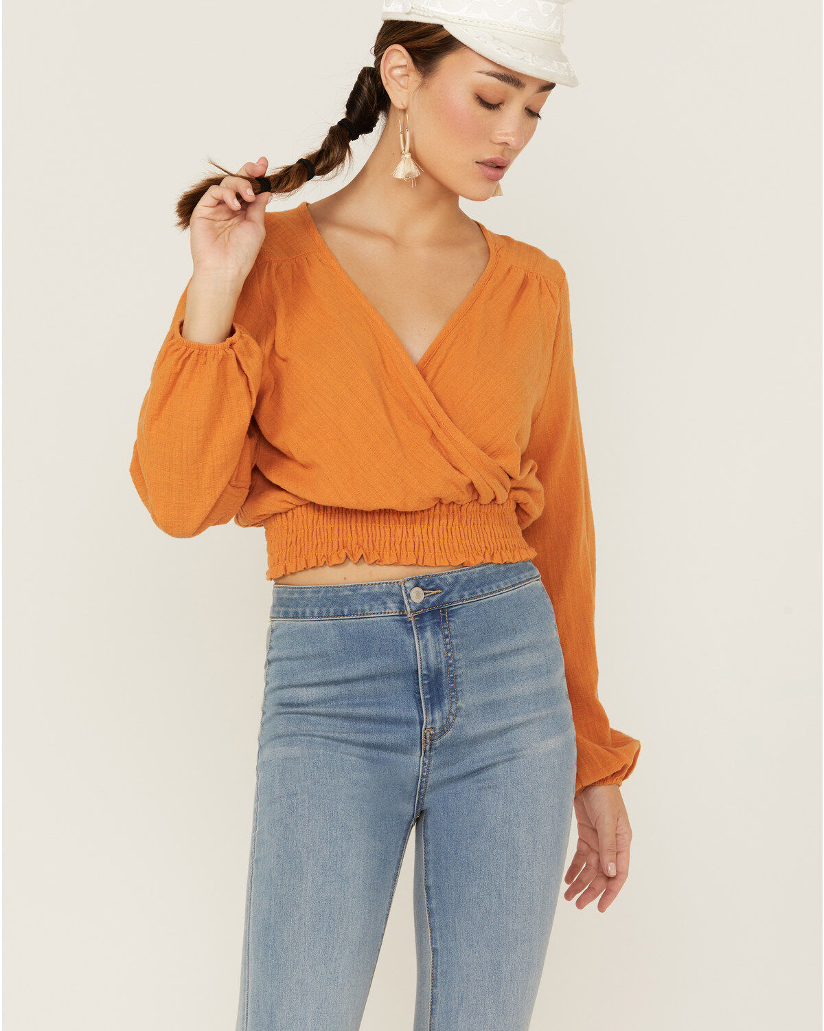 214970-saints-amp-hearts-women-s-long-sleeve-surplice-smocked-waist-crop-top-1.jpg