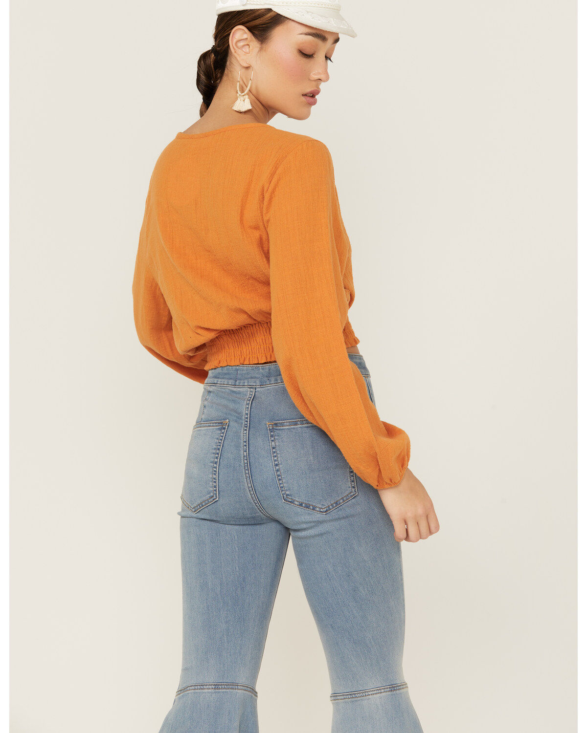 214970-saints-amp-hearts-women-s-long-sleeve-surplice-smocked-waist-crop-top-1.jpg