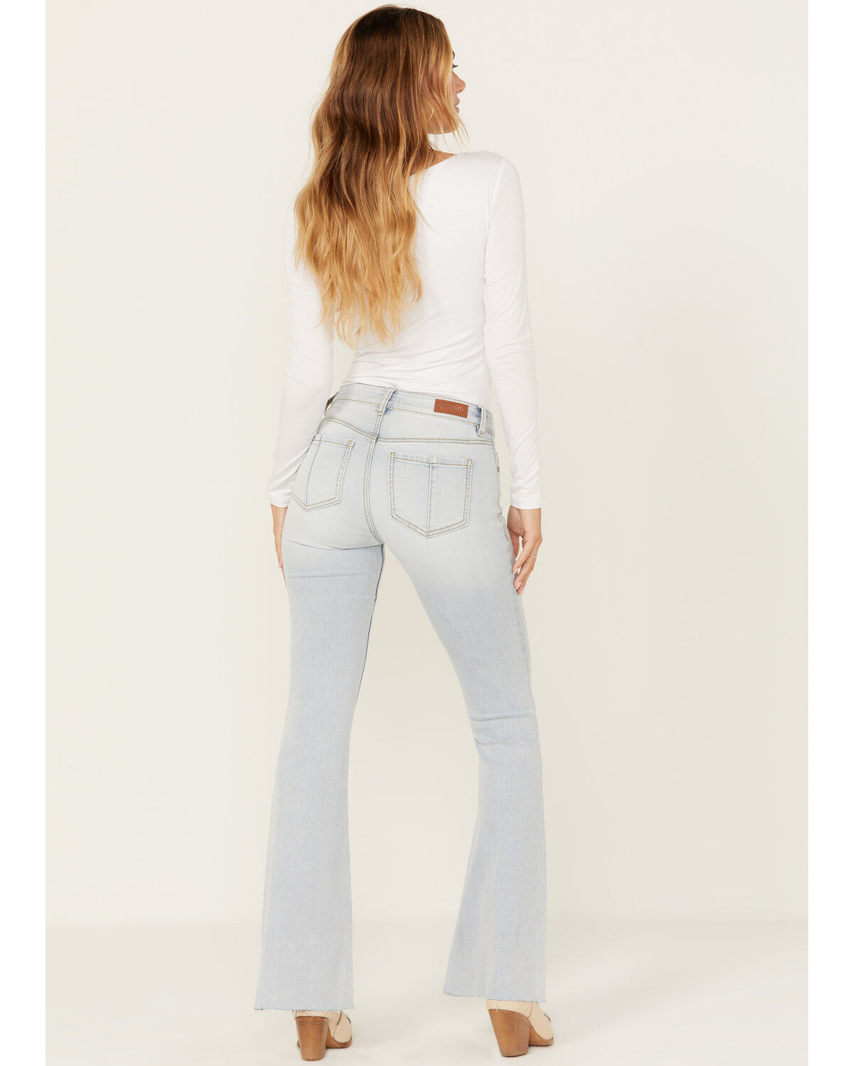 241893-shyanne-women-s-agave-light-wash-mid-rise-destructed-stretch-flare-jeans-1.jpg