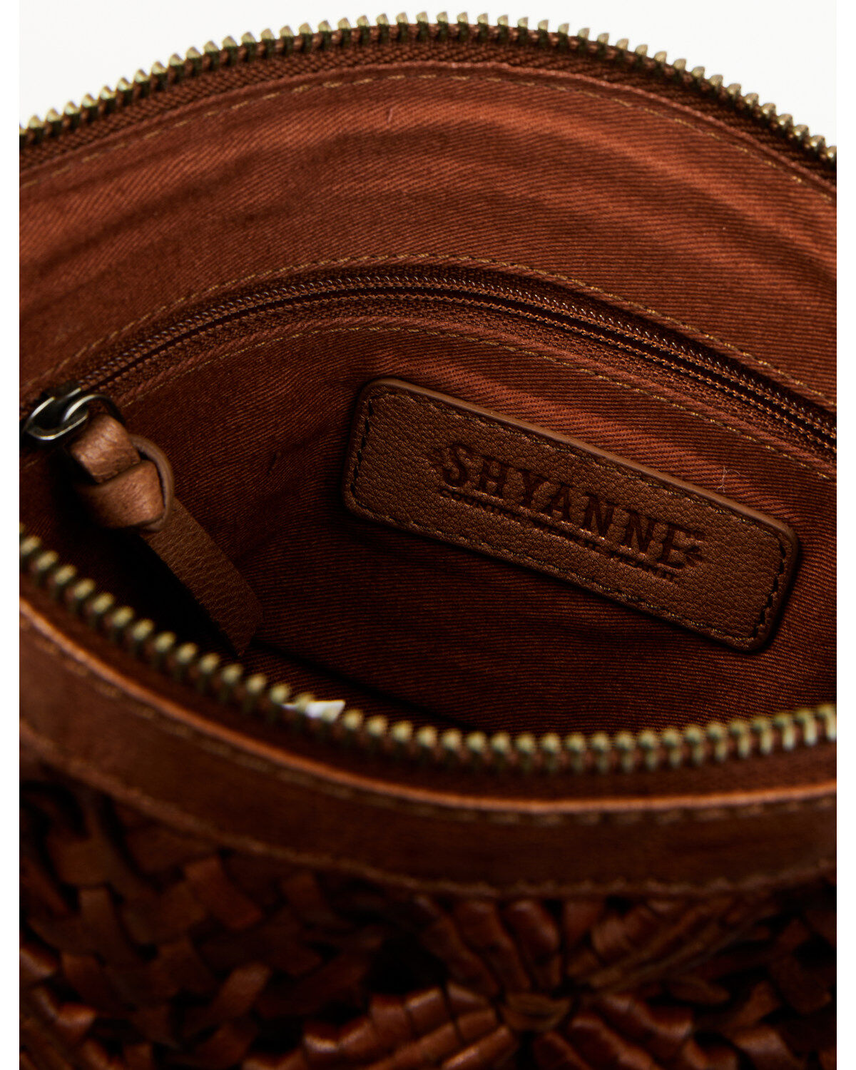 300240-shyanne-women-s-western-heritage-woven-leather-fringe-crossbody-bag-1.jpg
