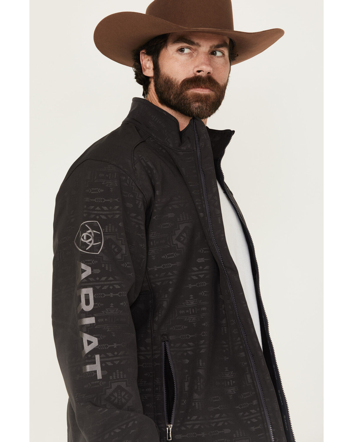 308319-ariat-men-s-phantom-embossed-southwestern-print-logo-2-0-softshell-jacket-1.jpg