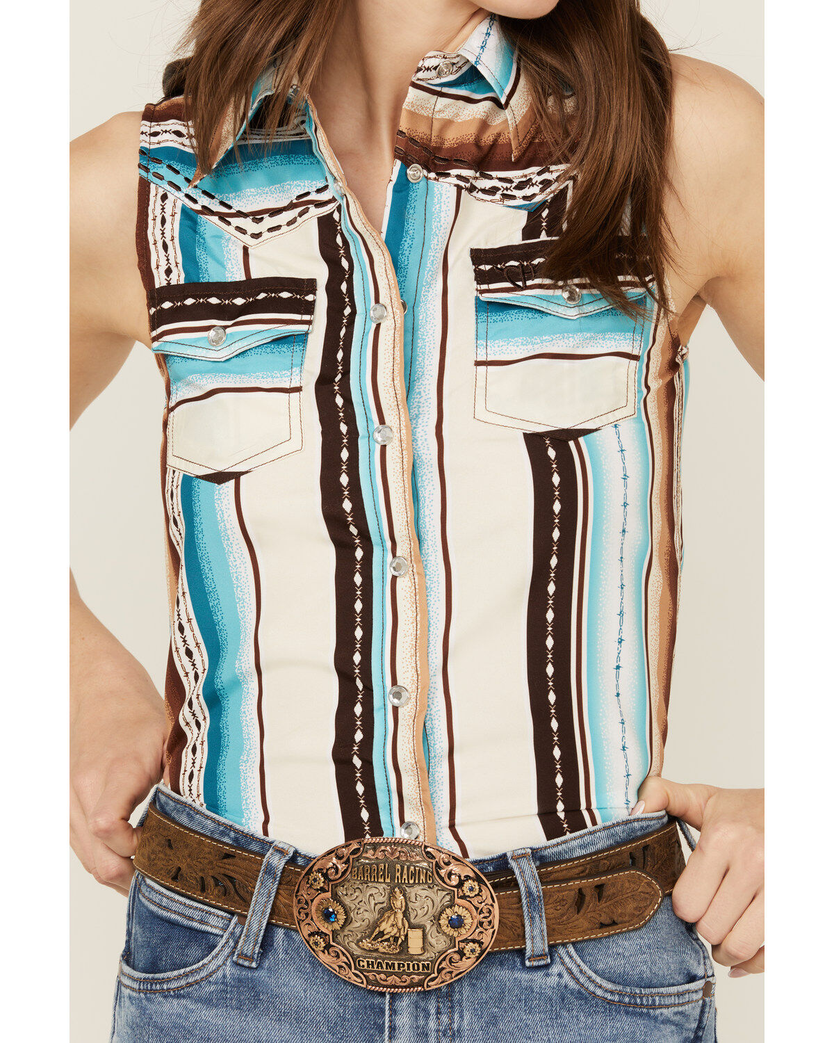 312237-cowgirl-hardware-women-s-serape-striped-sleeveless-snap-western-shirt-1.jpg
