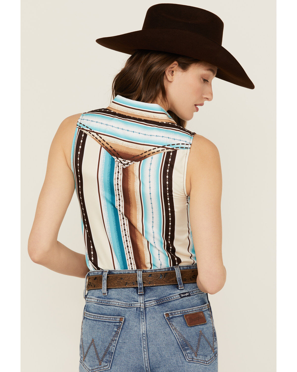 312237-cowgirl-hardware-women-s-serape-striped-sleeveless-snap-western-shirt-1.jpg