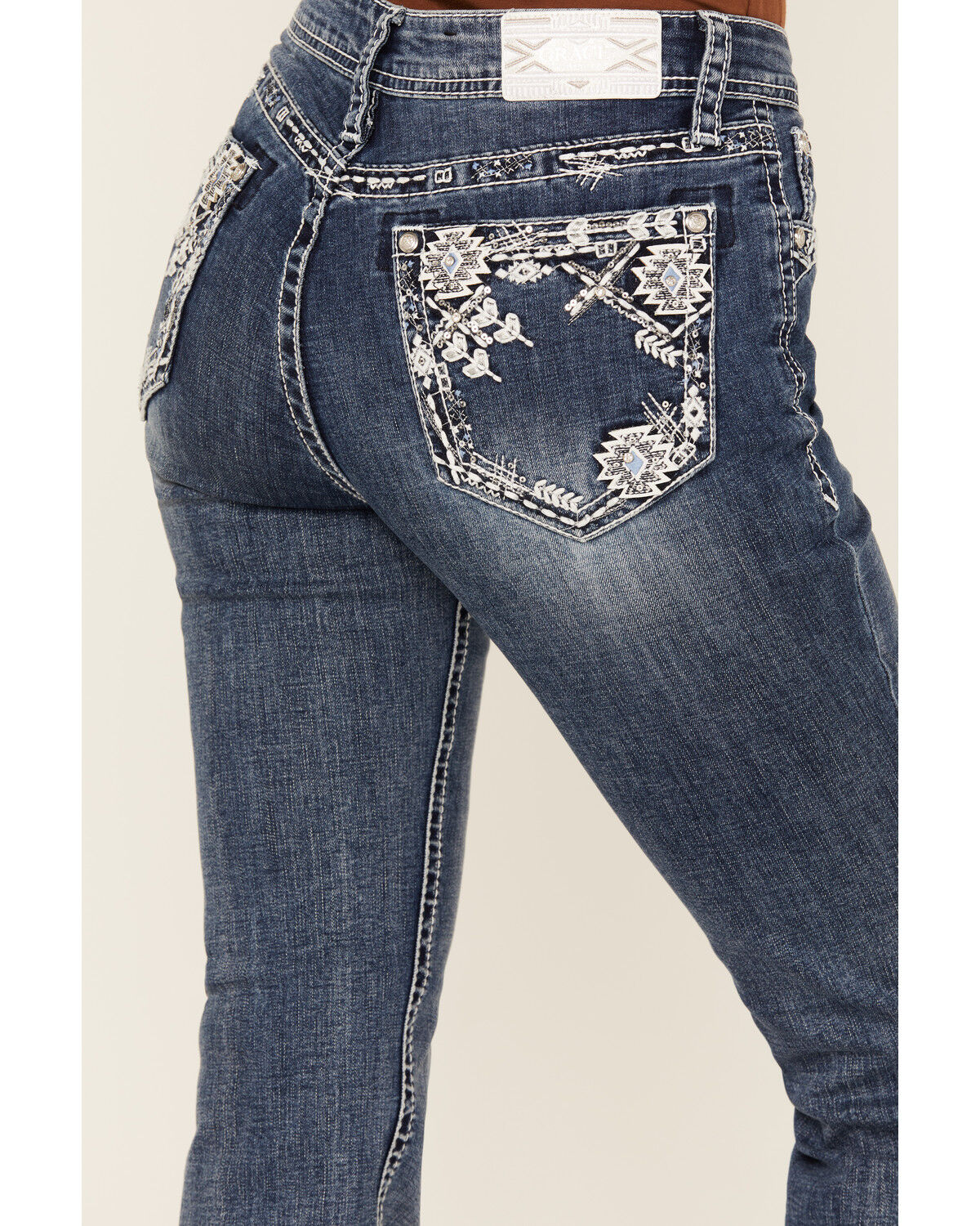 323790-grace-in-la-women-s-medium-wash-geo-print-embroidered-mid-rise-bootcut-stretch-denim-jeans-1.jpg