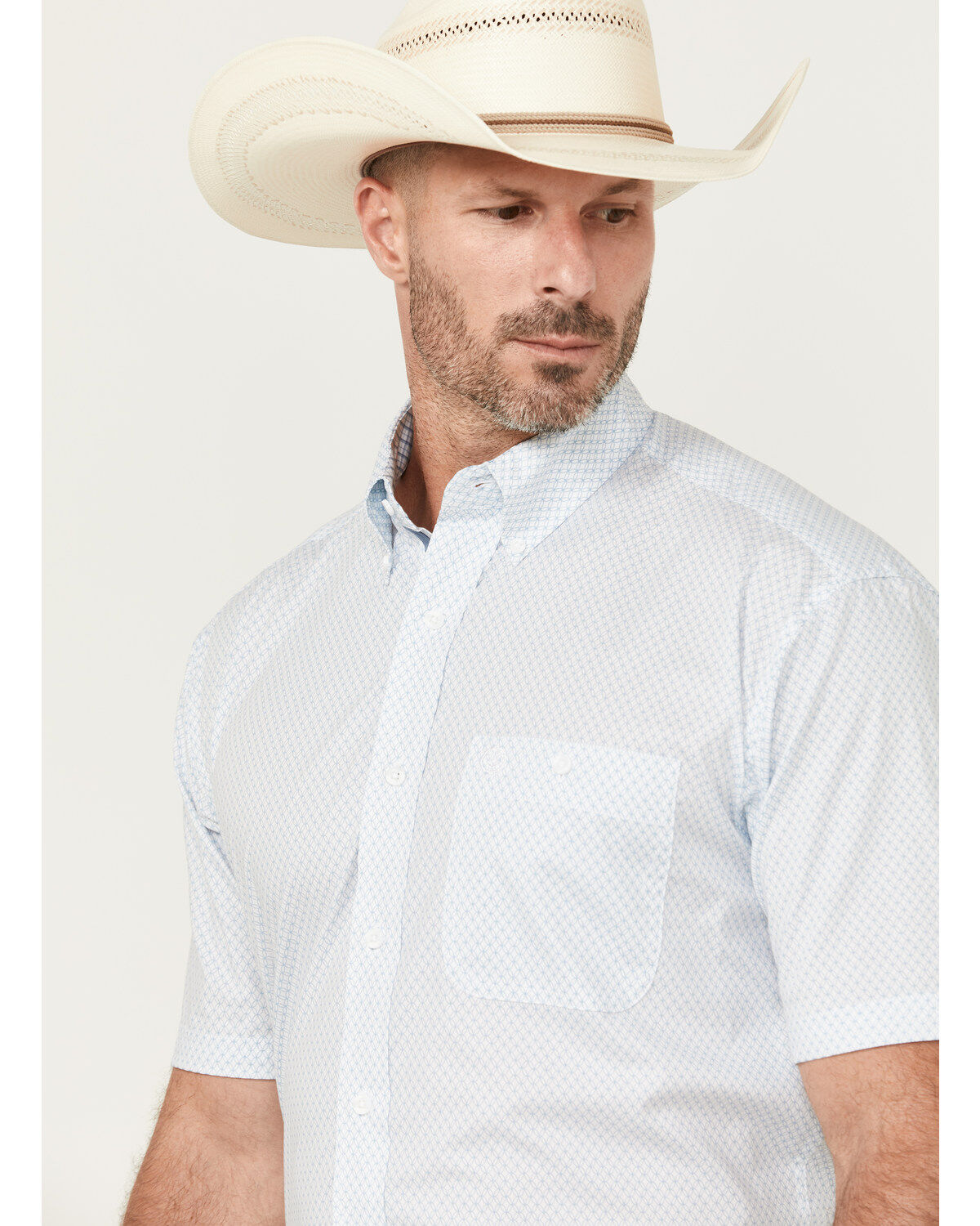 326387-george-strait-by-wrangler-men-s-geo-print-short-sleeve-button-down-stretch-western-shirt-1.jpg