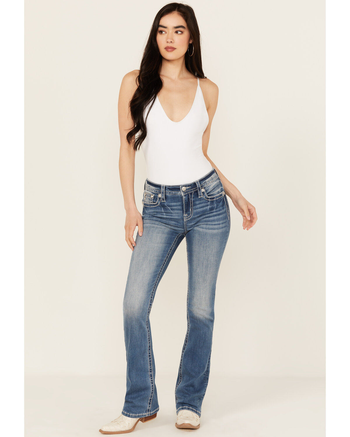 331923-miss-me-women-s-medium-wash-mid-rise-wing-pocket-34-bootcut-stretch-denim-jeans-1.jpg