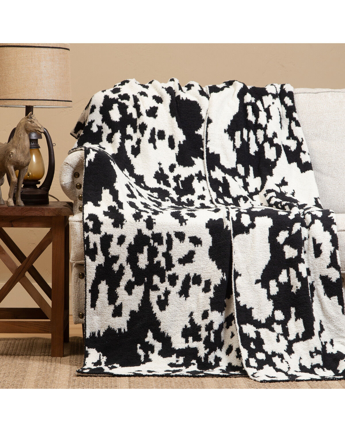 394625-carstens-home-wrangler-cow-print-blanket-1.jpg